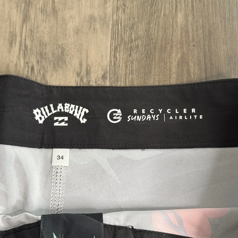 Billabong Black Board Shorts with Orange and Green Design